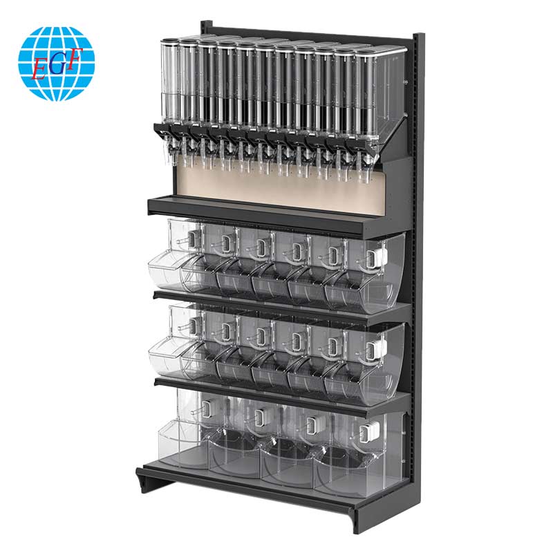This bulk food display shelf features a high‑strength metal frame with stable structure and great load‑bearing capacity, ideal for bulk‑selling scenarios in supermarkets, snack shops and candy stores. It is fitted with gravity feed dispensers on the upper section and multiple sets of transparent flip‑top plastic bins on lower tiers. It provides compartmentalized display for bulk goods such as nuts, candies and dried food with good product visibility and easy item access. Custom specifications and structures are available. Easy to assemble and disassemble, it allows flexible adjustment of shelf positions and accessories to meet bulk purchase demands, delivering an efficient display solution for self‑service bulk retail.